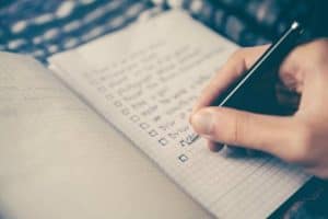 Writing To Do List in Notebook